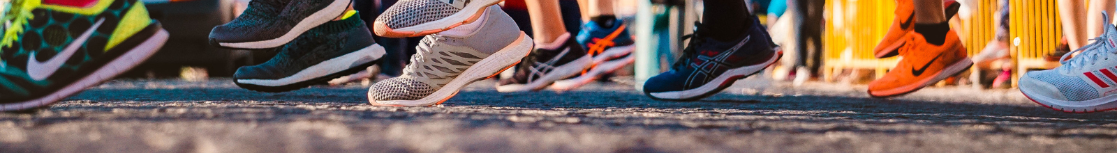 Running shoes in a group of people