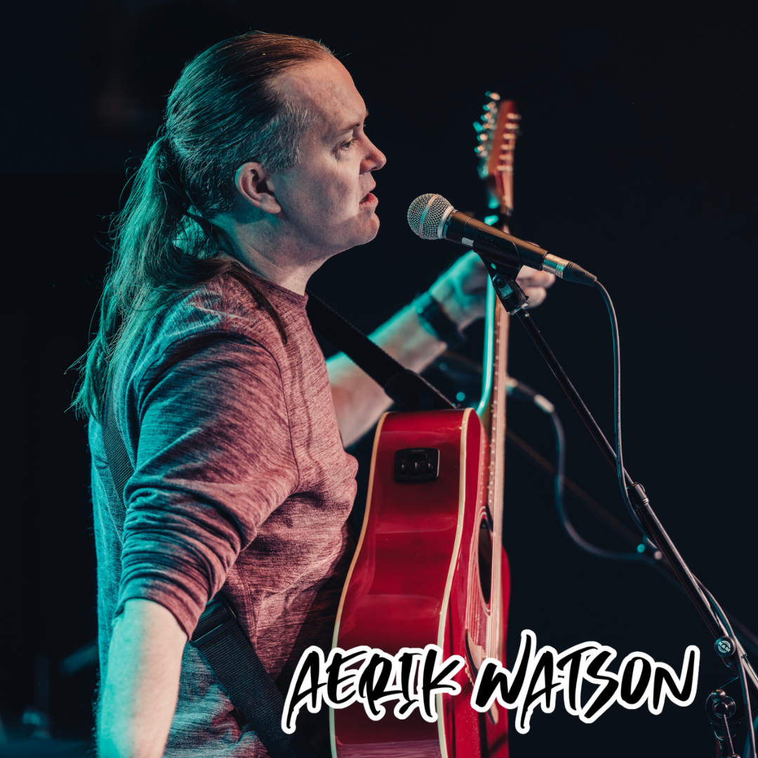 Aerik Watson playing the guitar