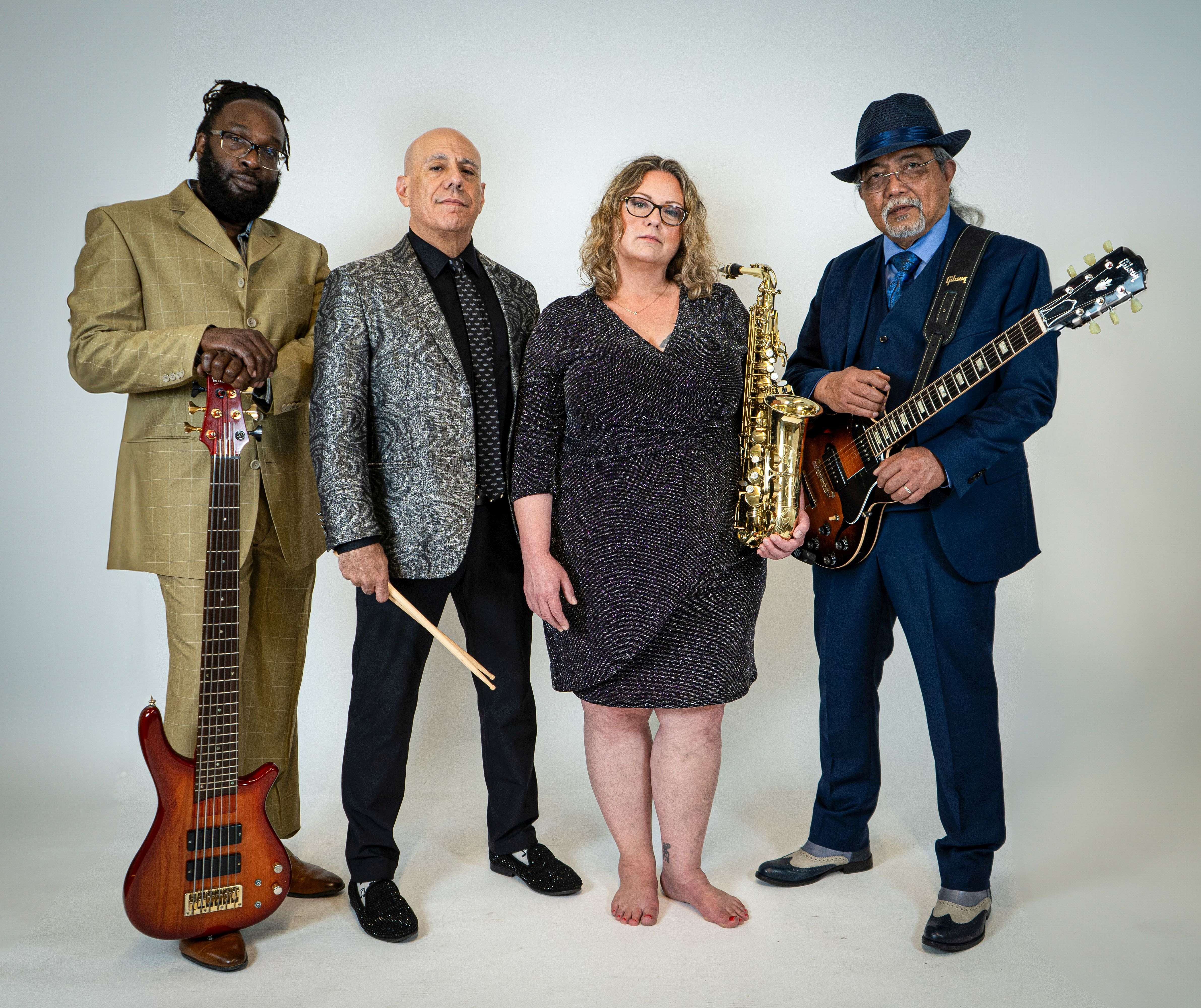 Members of AnjChito posing for a photo