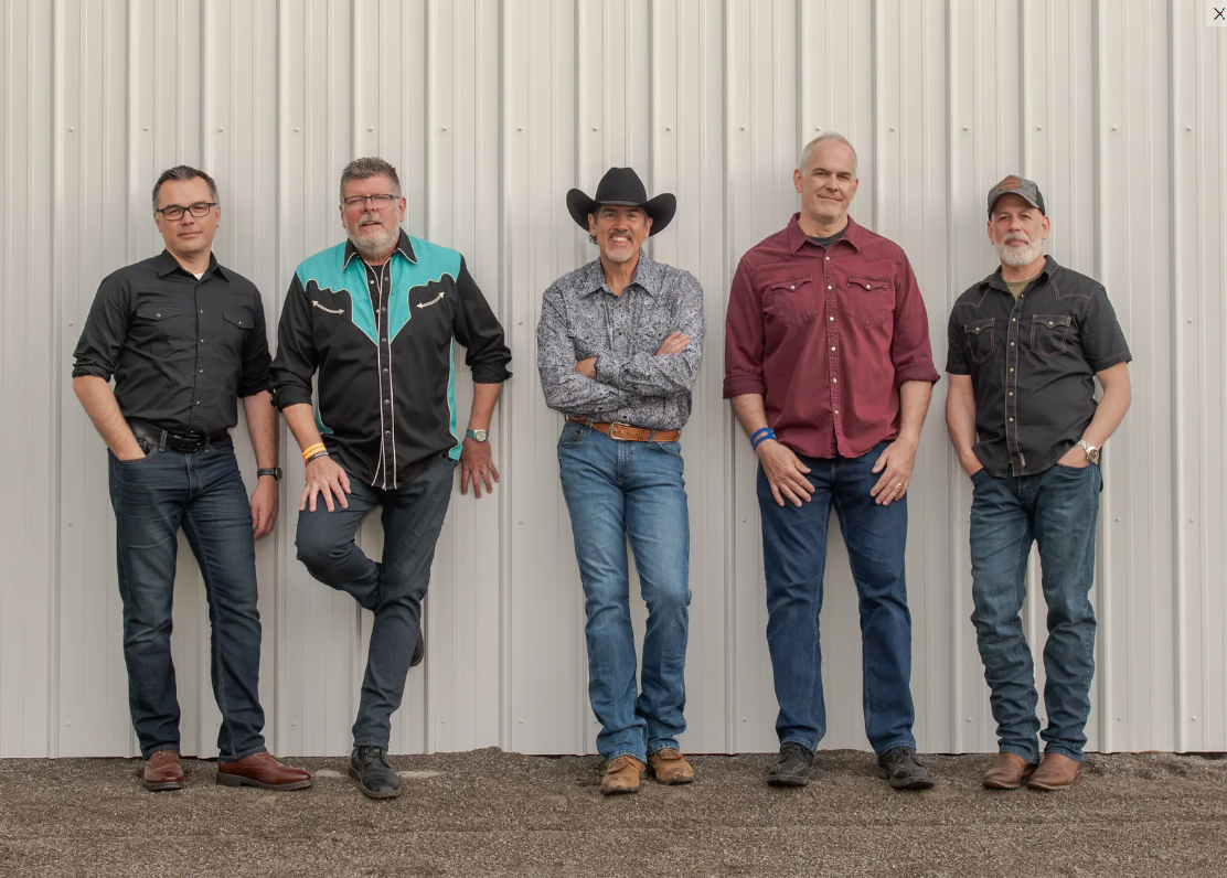 Members of The Derringers posing for a photo