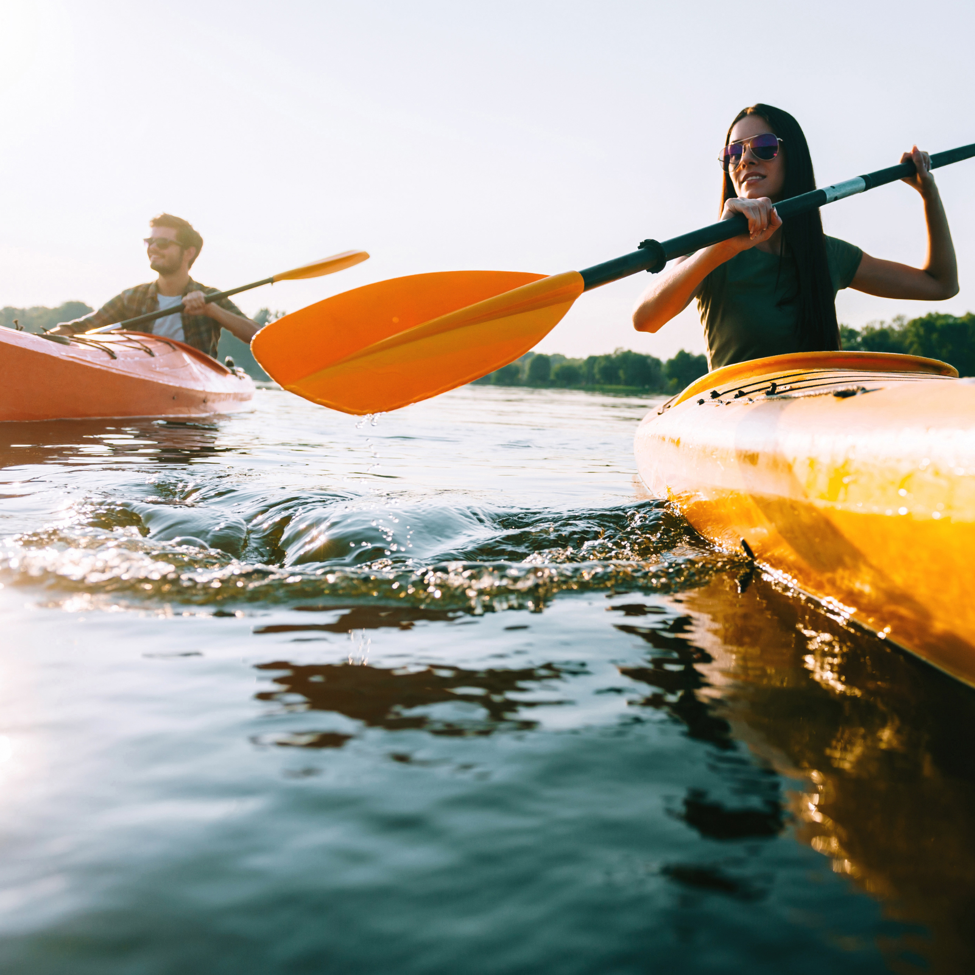 Two people in a kayak on a body of water