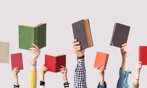 people holding books