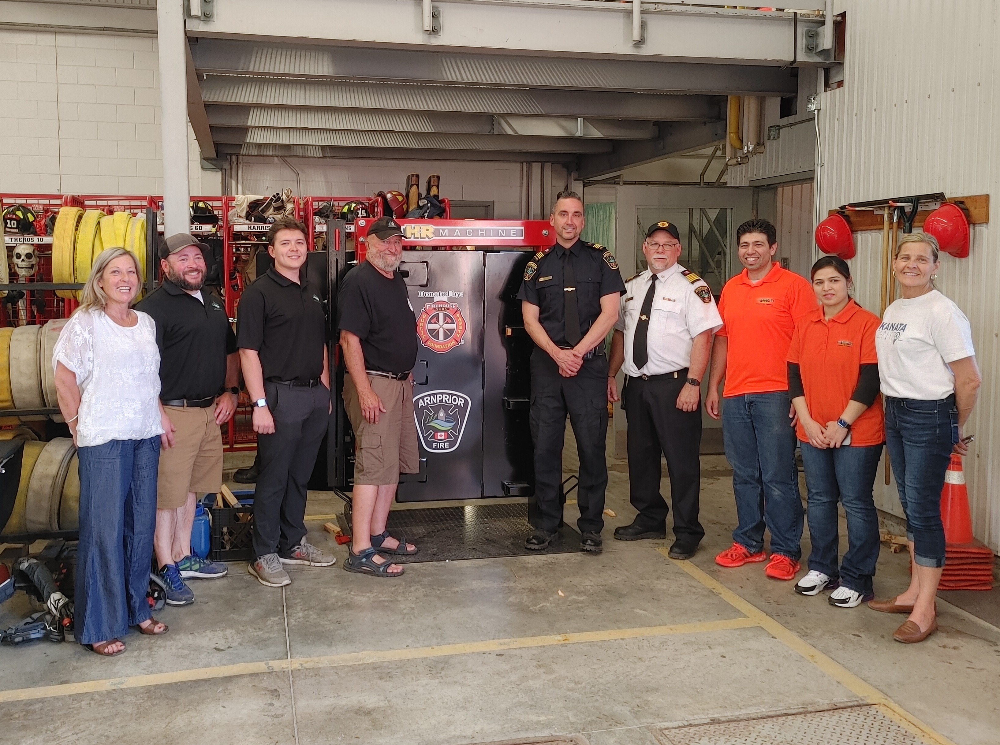 council and the arnprior fire department in front of donation