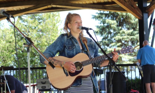 Performer singing at Priorpalooza Music Festival