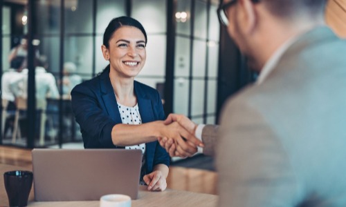 Two people shaking hands