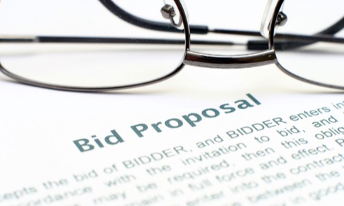 Bid proposal with glasses