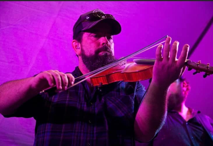 Kyle Felhaver playing the fiddle