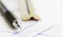 building plans with a ruler