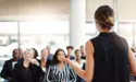 someone speaking at an event 