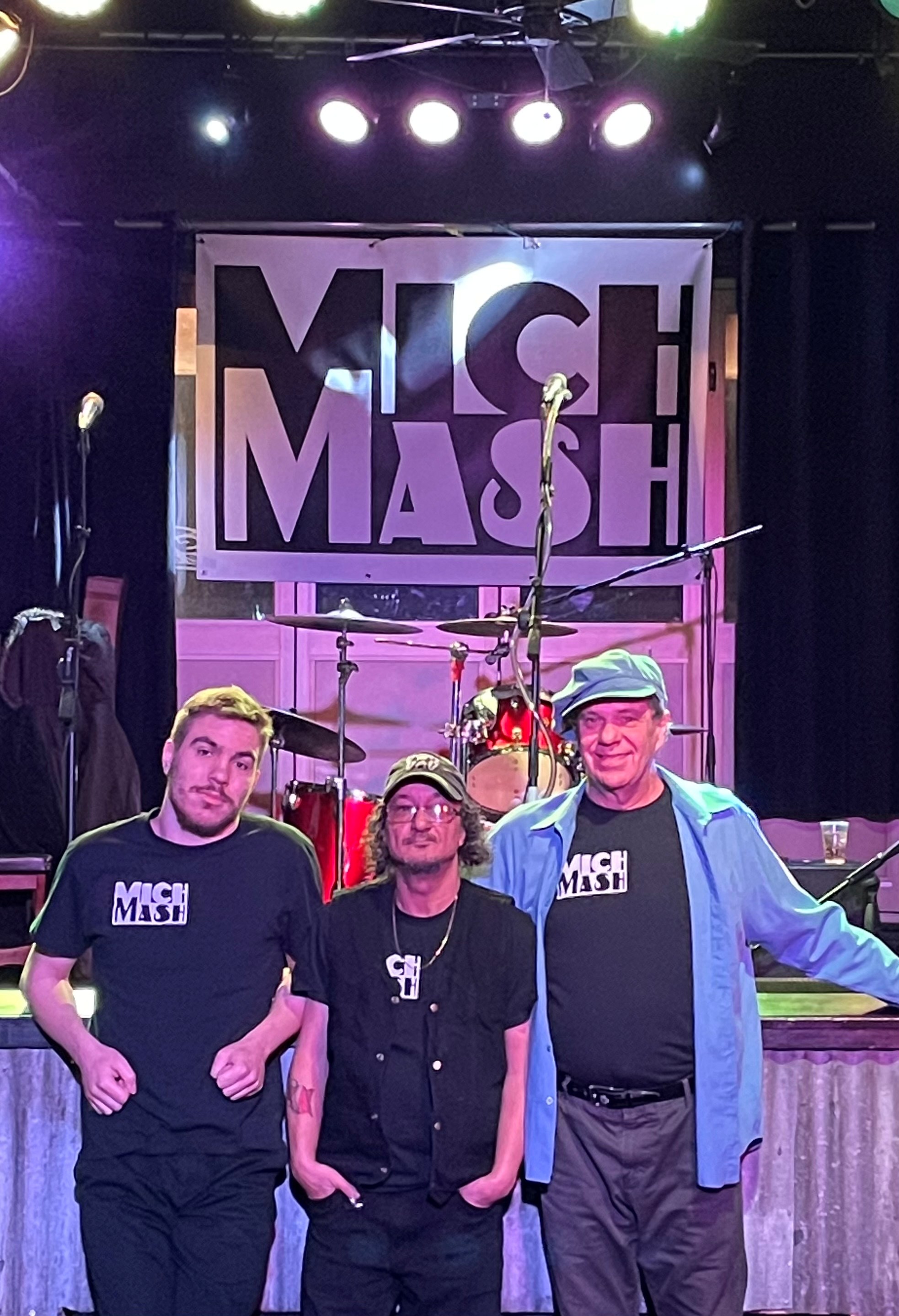 Members of Mich Mash posing for a photo